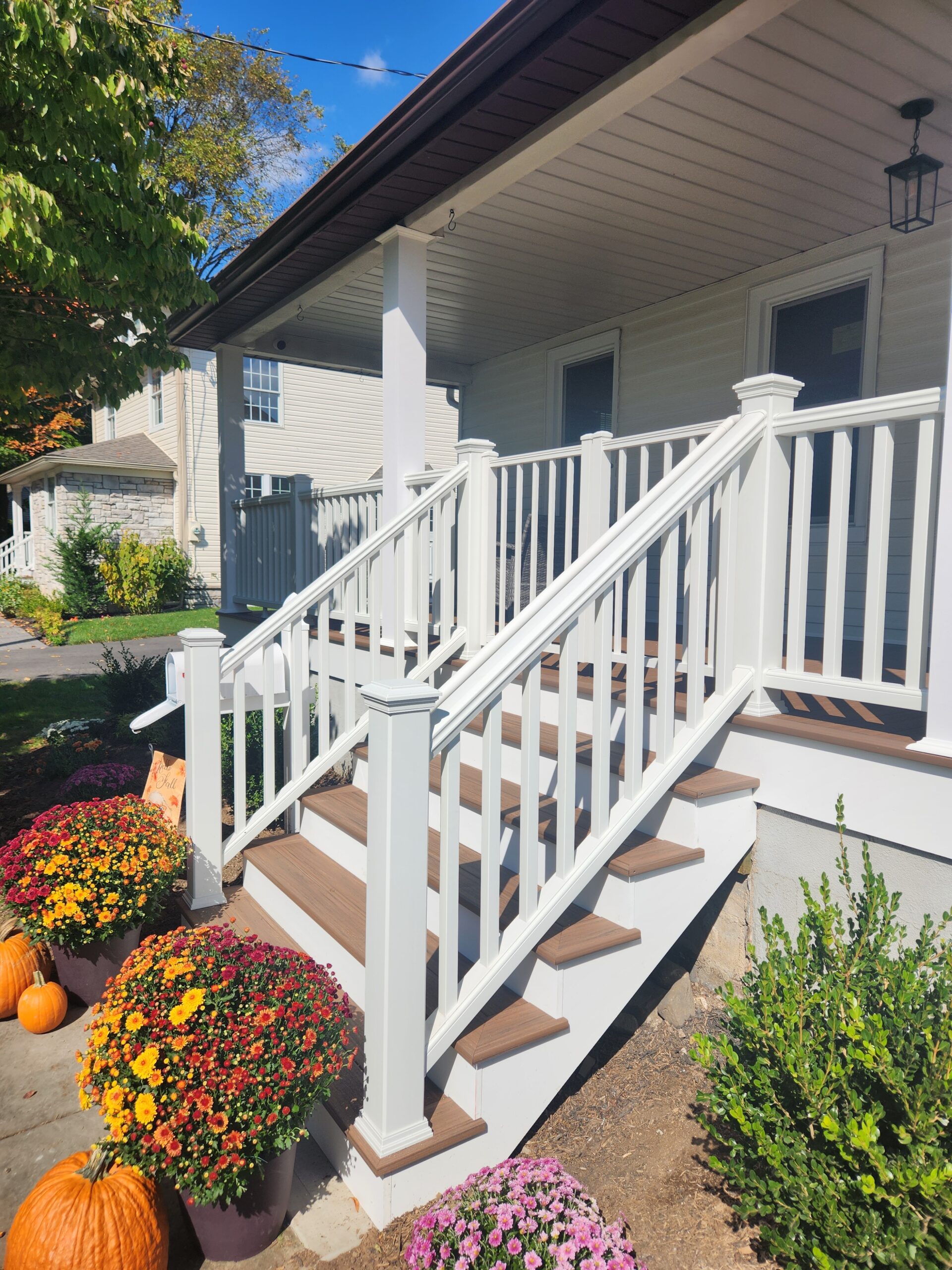 Porch in Allendale using PVC decking and composite railings