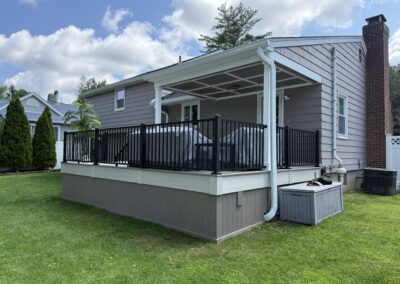 Deck with roof and skirting